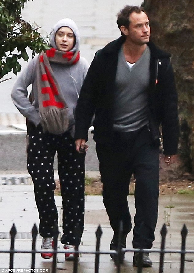 Like father like daughter: Jude Law, 44, and his stunning daughter Iris, 15, enjoyed a low key day on Saturday as they headed out in London in comfortable and casual tracksuits