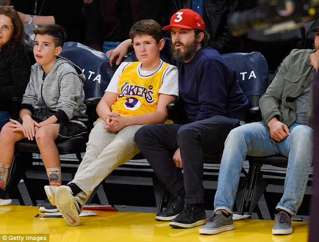 Lakers time: Casey Affleck was spotted on Friday night at the Staples Center in Los Angeles watching a basketball game with his son Indiana