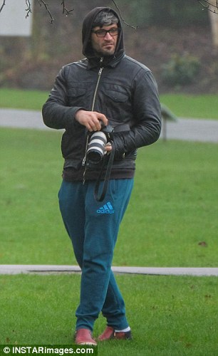 Fadi, 40, was seen taking photos in Regent's Park this morning