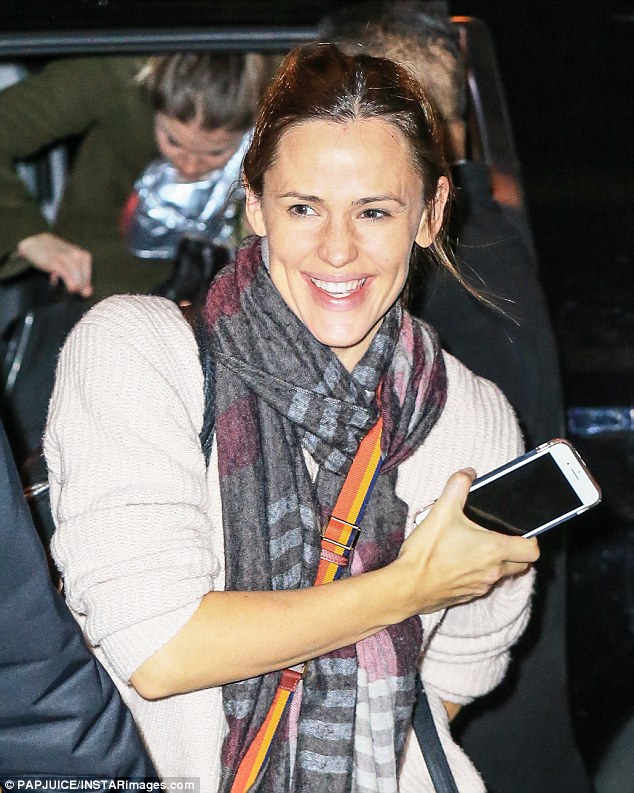 In the Big Apple: The actress seemed upbeat and very happy after the cross-country trip