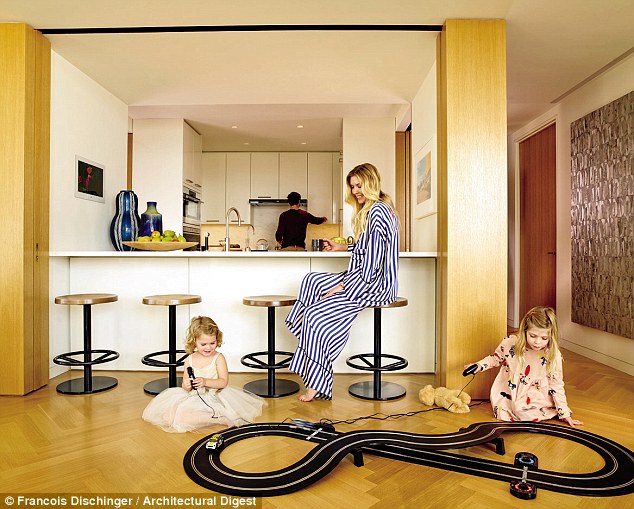 Inside Jimmie Johnson's West Village Apartment:  Jimmie and Chandra Johnson's New York home allows the family to always be in the fast lane. Pictured are Chandra (center), Evie (6, right) and Lydia (3, right), enjoying a quiet morning in their lovely apartment