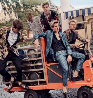 The ads star the offspring of celebrities, including Cindy Crawford and Rande Gerber's 17-year-old son Presley Gerber (front, in blue) and Daniel Day-Lewis' son Gabriel Kane (pictured in leopard)