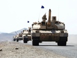 Saudi tanks are deployed in the Yemeni coastal district of Dhubab, during a military operation against Shiite Huthi rebels on January 7, 2017