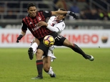 AC Milan's Carlos Bacca, left, vies for the ball with Cagliari's Bruno Alves during a Serie A soccer match between AC Milan and Cagliari, in Milan's San Siro...