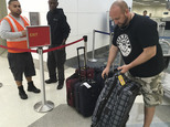 Dan Kovacs waits at the Fort Lauderdale-Hollywood International Airport, Saturday, Jan. 7, 2017. Kovacs and his family were going through security when gunfi...