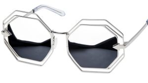 Sunglasses, $429, Karen Walker.