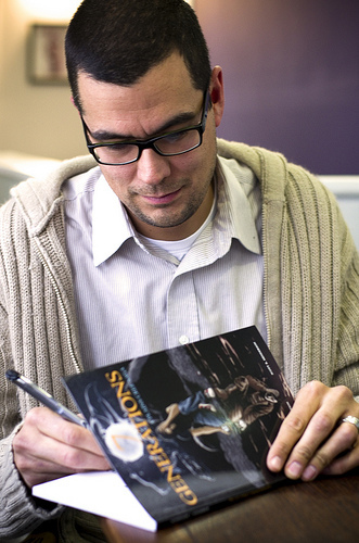 RobertsonSigning a book