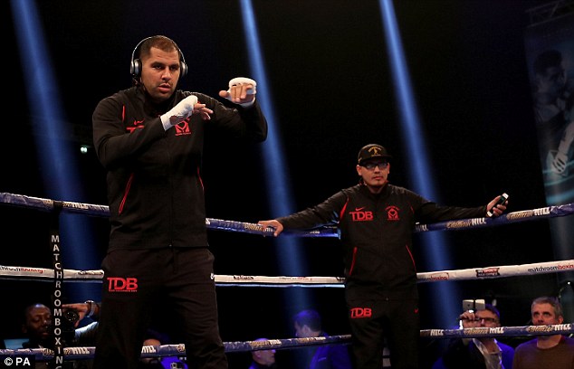 Molina, pictured during his public workout, believes he can land a knockout blow on Joshua