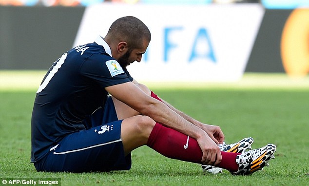 Heading home: Benzema couldn't find the back of the net, despite his last-gasp effort