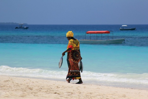 ZANZIBAR, TANZANIA. Two large islands and a host of smaller ones make up this semi-autonomous region. Zanzibar town on ...