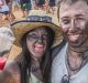 First-time Summernats patrons Amy Judd and Chris Meli of Melbourne have spent five hours in the front row of the ...