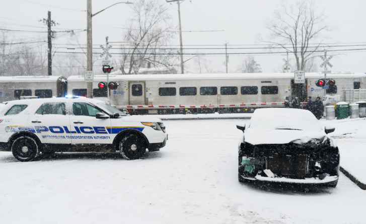 A LIRR train struck the front of a car (pictured at right) at the Little Neck Station railroad crossing on Saturday.