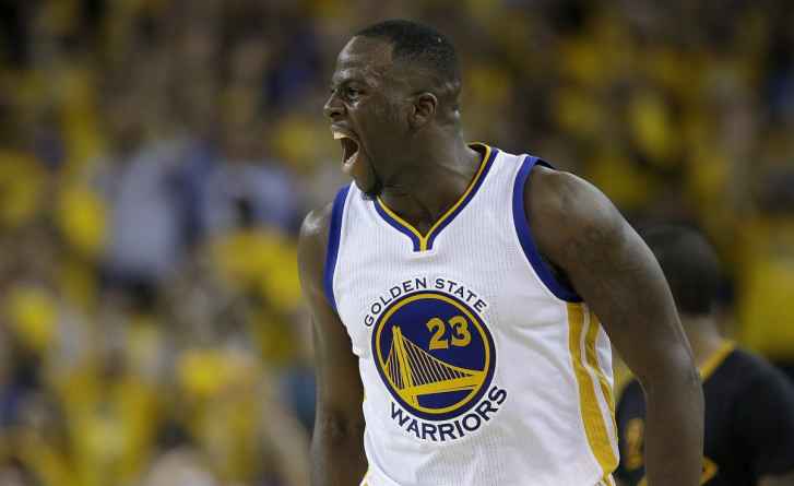 Golden State Warriors forward Draymond Green reacts after scoring against the Cleveland Cavaliers during the second half of Game 7 of basketball's NBA Finals in Oakland, Calif., Sunday, June 19, 2016. (AP Photo/Marcio Jose Sanchez)