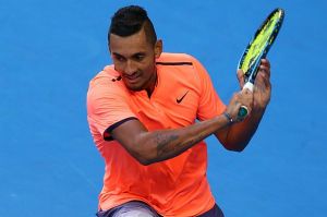 Met with boos: Nick Kyrgios on his way to a straight sets Hopman Cup loss to Jack Sock in Perth last week.