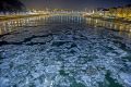 Ice floes float in the water of River Danube at the Szabadsag (Freedom) Bridge in Budapest, Hungary. 