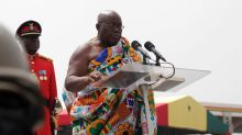 Ghana's chief justice swore in the nation's newly elected President Nana Akufo-Addo amid a sea of people dressed in the ...