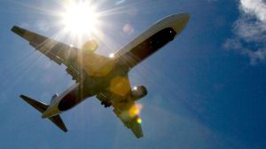 Generic. A Delta Airlines plane flies into Portland International Airport in Portland, Ore., Monday, July 20, 2009. ...