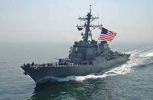 Guided-missile destroyer USS Mahan (DDG 72) approaches guided-missile cruiser USS Normandy (CG 60) during a Sail Pass in the Baltic Sea.