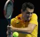 Streamlined: Bernard Tomic plays a backhand during the Fast4 International Exhibition match against Dominic Thiem.