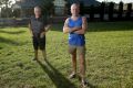 Alan Turner (right) and Paul Robinson live next to land Melbourne Water wants to sell in Rona Street, Reservoir. The ...