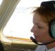 Ms Ley at the controls of her light plane.
