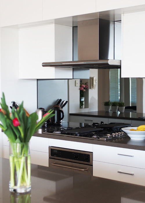 Kitchen With Mirror Splashback by Kitchens by Kathie