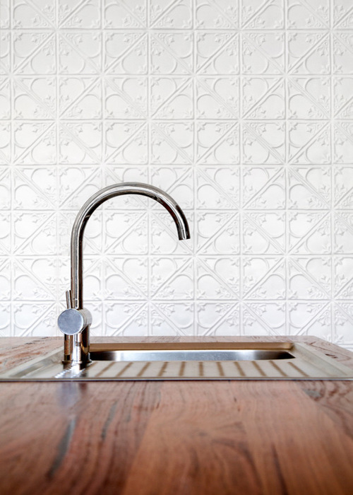 Kitchen With White Splashback by Auhaus Architecture