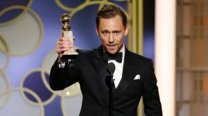 Tom Hiddleston with the award for best actor in a limited series or TV movie for <i>The Night Manager</i> at the 2017 ...