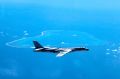 A Chinese H-6K bomber patrols the islands and reefs in the South China Sea.