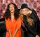 Solange Knowles (L) and Beyonce Knowles pose for a photo against the bounce bus at the cocktail reception for "Amen ...