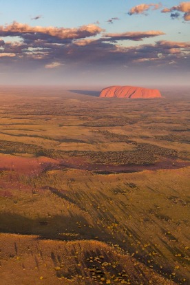 Uluru from the air. The increased rainfall in Central Australia in 2016 has turned the red centre a touch of green!