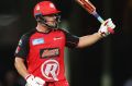 Renegades captain Aaron Finch of the Renegades celebrates his half-century during the Big Bash League match against ...