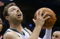 Milwaukee's Matthew Dellavedova goes up to shoot.