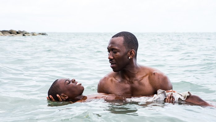 Mahershala Ali and Alex R. Hibbert in Moonlight (2016)