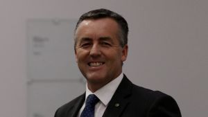 Transport Minister Darren Chester settled an investment property purchase while on a taxpayer-funded trip in Melbourne. 