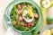 Green lentil and quinoa salad with poached eggs and basil pesto