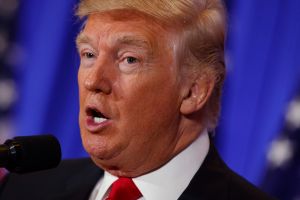 President-elect Donald Trump speaks during a news conference in the lobby of Trump Tower in New York Wednesday, Jan. 11, ...