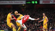 LONDON, ENGLAND - JANUARY 01: Olivier Giroud of Arsenal scores the opening goal during the Premier League match between ...
