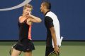 Double trouble: Nick Kyrgios and Eugenie Bouchard play mixed doubles at last year's US Open.