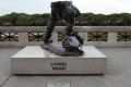 Destroyed: The Lionel Messi statue in Buenos Aires.