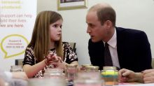 Prince William, Duke of Cambridge speaks to Aoife, 9, during his visit to a Child Bereavement UK Centre in Stratford on ...