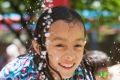 Twins Nyima and Dawa Wangchuk, 10, and Cassidy Schlesinger, 10, all of Dickson cooling off at Dickson pool on Tuesday.