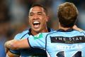 Blues brother: Tyson Frizell celebrates scoring a try during game three of this year's Origin series.