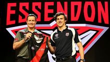 SYDNEY, AUSTRALIA - NOVEMBER 25:  Essendon Football Club head coach John Worsfold poses for a photo with the number one ...
