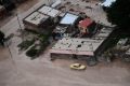 Road are covered in mud after a landslide triggered by a storm in the village of Volcan, Argentina.