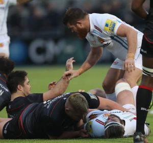 Gone: Richard Barrington assists Geoff Parling after a high tackle that saw Barrington given the first red card under ...