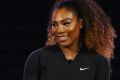 Maintaining focus: Serena Williams, pictured with Kei Nishikori at Melbourne Park on Thursday.