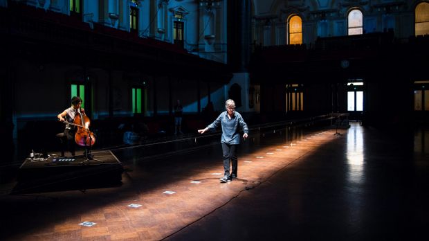 Ellen Fullman and Theresa Wong prepare in a deserted Town Hall.