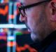 A trader works at the New York Stock Exchange, Monday, Jan. 9, 2017. Stocks are opening mostly lower on Wall Street, led ...