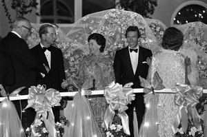 Princess Margaret, her husband Lord Snowden, and Mr. C. V. Whitney receive guests at the Whitney home at a party held in honor of the royal couple on Friday, May 4, 1974 in Lexington, Kentucky.